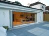 frameless slide and fold doors in new extension