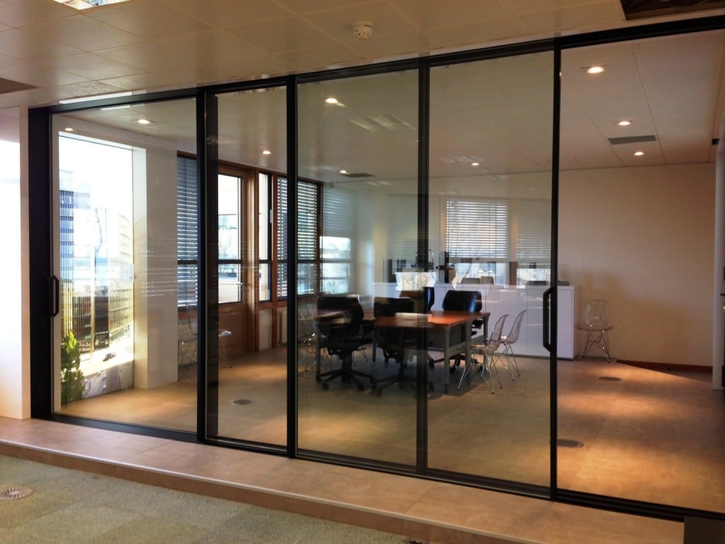 the reynaers hi-finity sliding door is designed to provide maximum glass area to create stunning glass walls