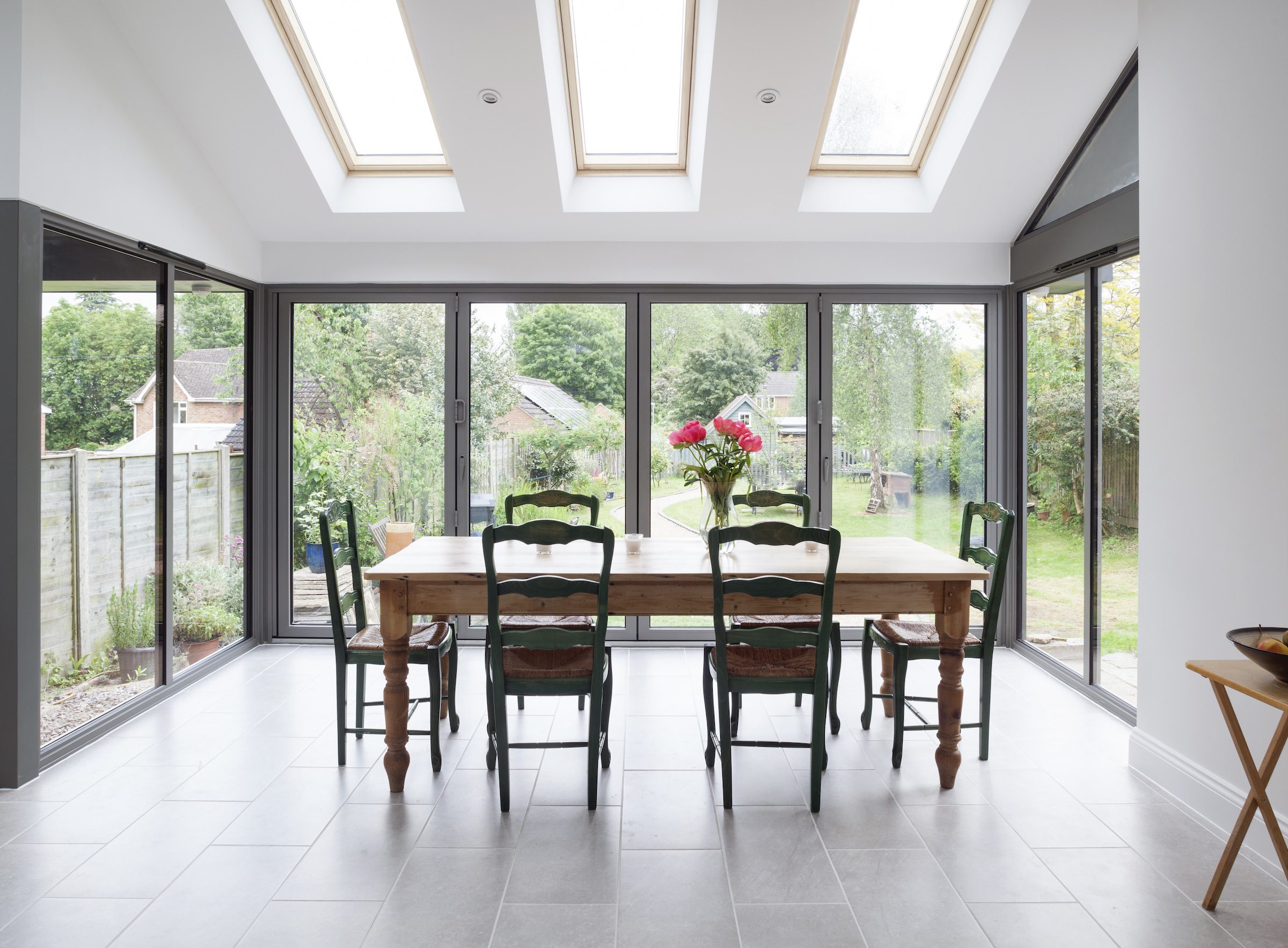 smart systems bifold doors in a glass room using visofold bifold doors 1000 model