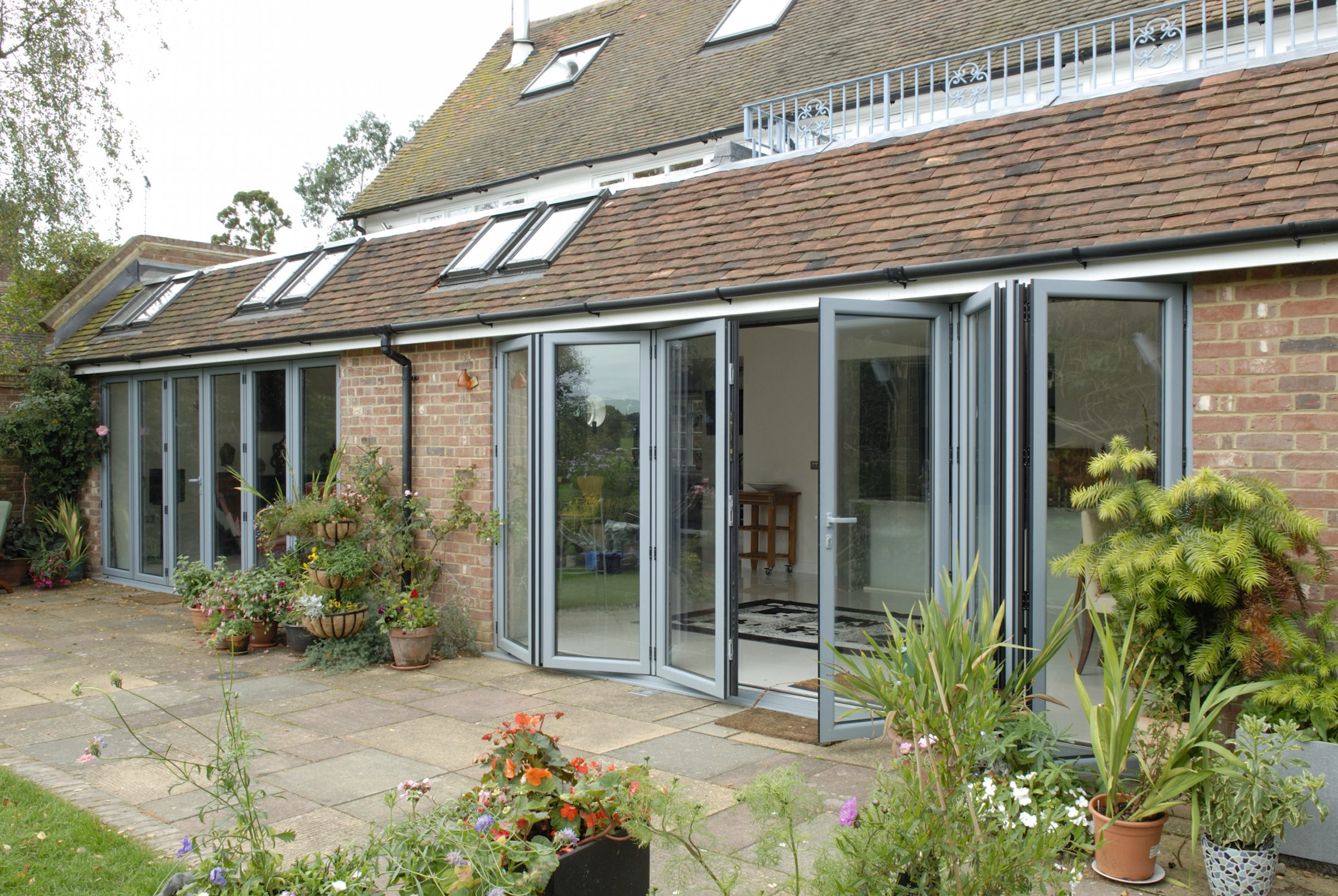 visofold 2000 bifold doors in a traditional house extension