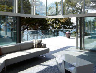 reynaers aluminium sliding doors in an open corner design