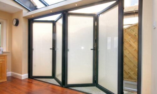 aluminium integral blinds in a bifold.