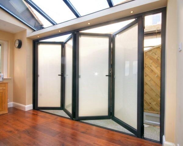 bifolding doors such as these premium schuco aluminium bifolds fitted with morley glass integral blinds presently do not fall under the window energy rating requirements. 