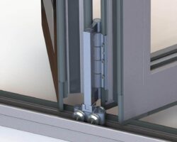 the new heavy duty roller in the aluk hd door is what offers additional glass weight. (image courtesy of aluk)