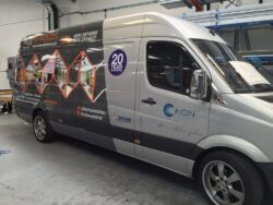 origin is a great example of a company helping their dealers though van signage, and excellent point of sale materials. 