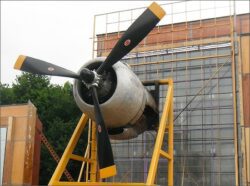 a kawneer curtain walling screen undergoing testing using an aeroplane engine to create wind speeds. 