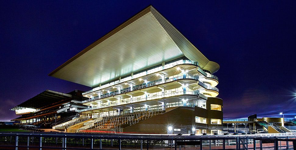 kawneer uk fitting in cheltenham racecourse grandstand with new windows and doors.