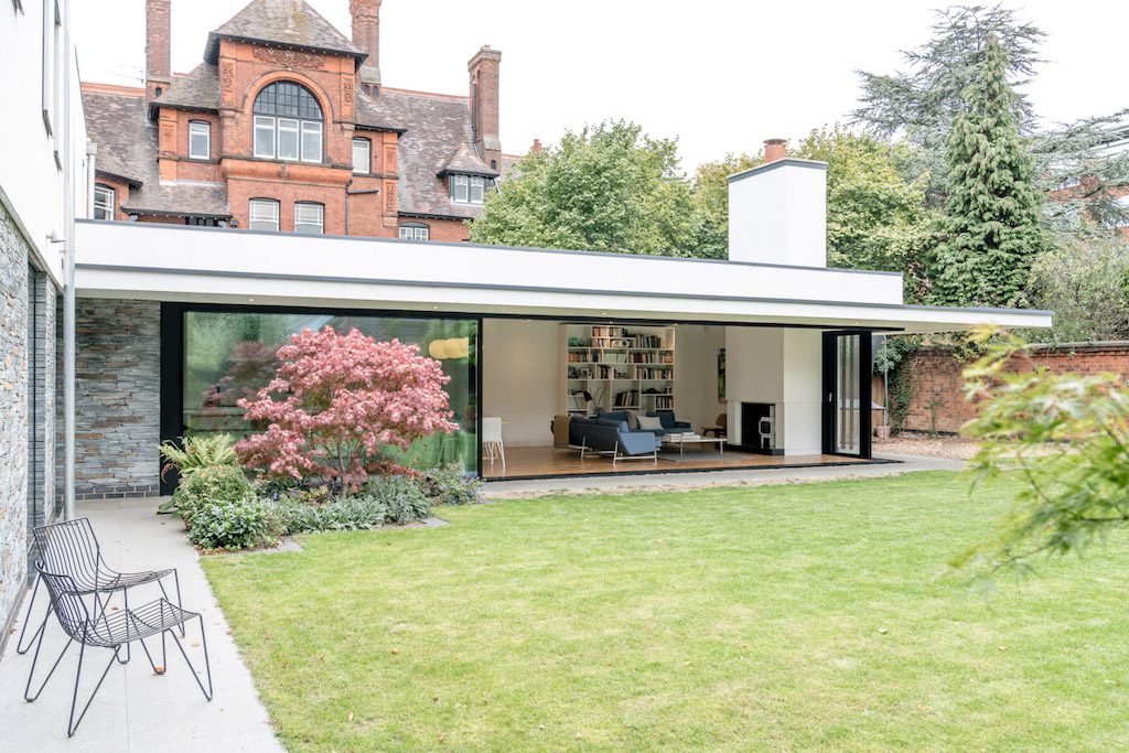 picture of a large house with bifolding or sliding doors 