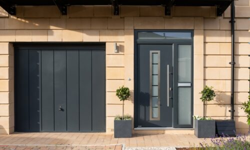 a new entrance door showing a hormann product in a new build home