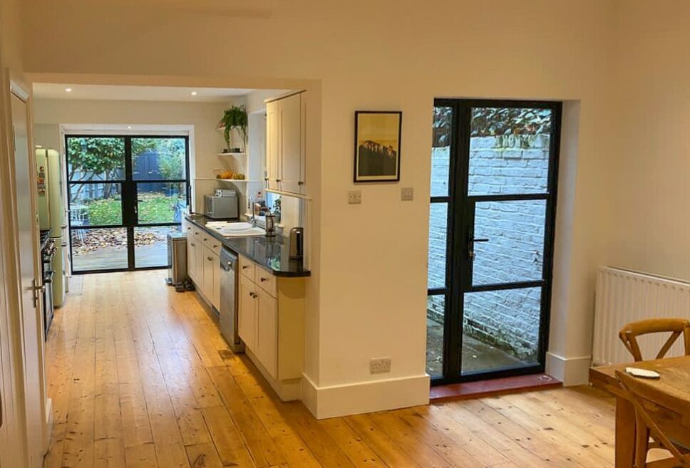 black aluminium crittall style doors in a kitchen