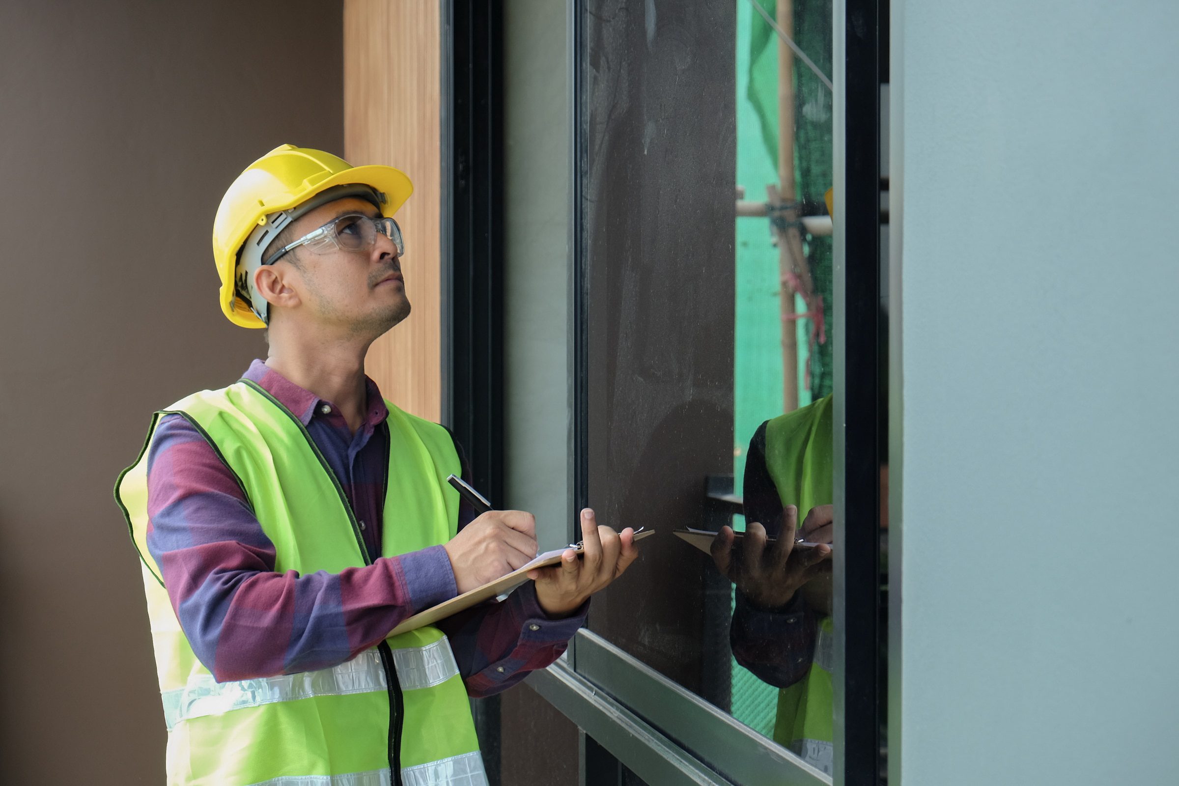 an engineer testing a window by an aluminium systems company