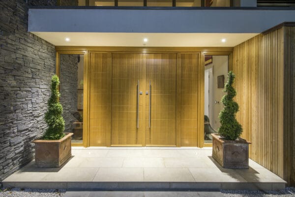 oak timber front door in a surrey mansion