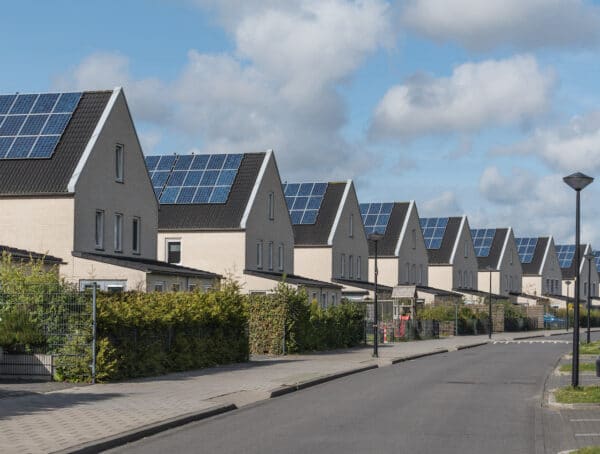 renewable energy / a new housing development where every house has solar panels fitted