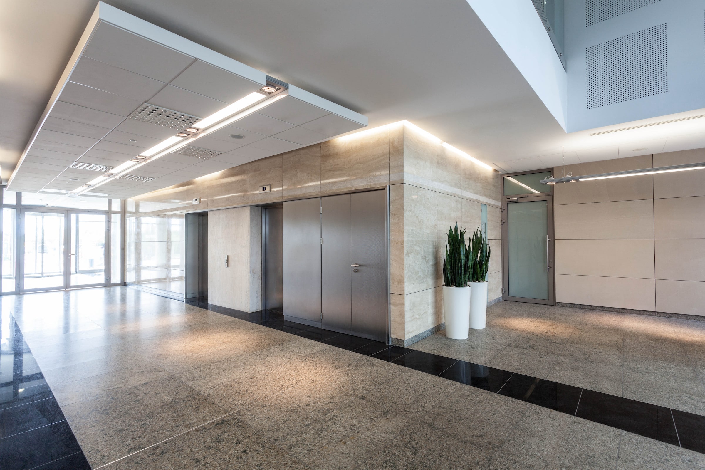 aluminium grey door inside modern apartment building