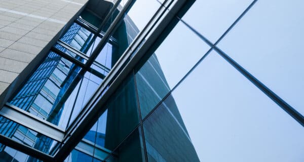 close up of structurally bonded glass facade on office building