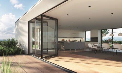 schüco as fd 75 bifold door outside view partially open with decking and wood flooring