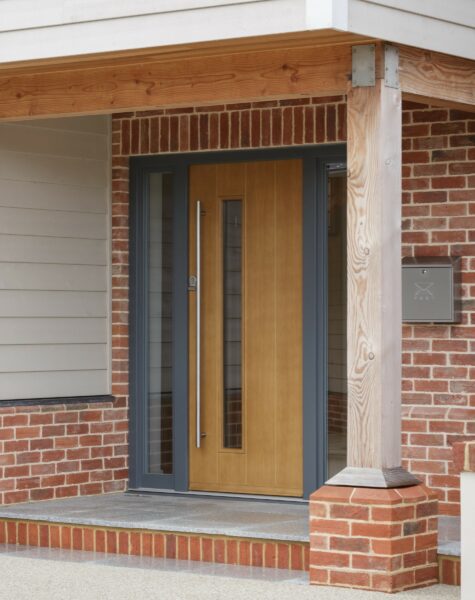 bereco contemporary front door in a grey surround frame