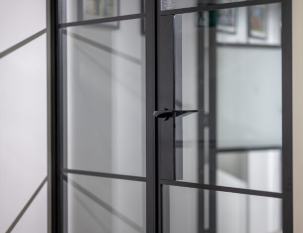 aluco steel look internal doors in black close up of the slim glazing bars