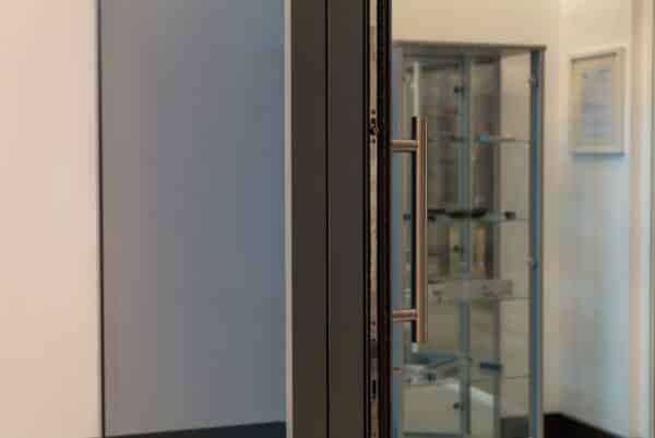 close up of flush stacking sliding doors. 