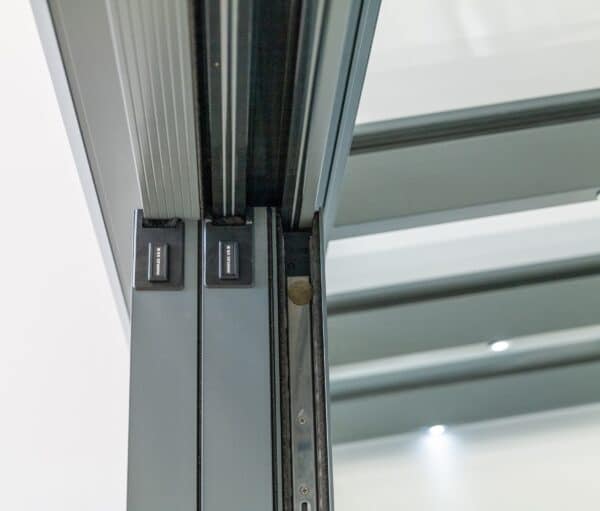 close up of flush stacking sliding doors. 