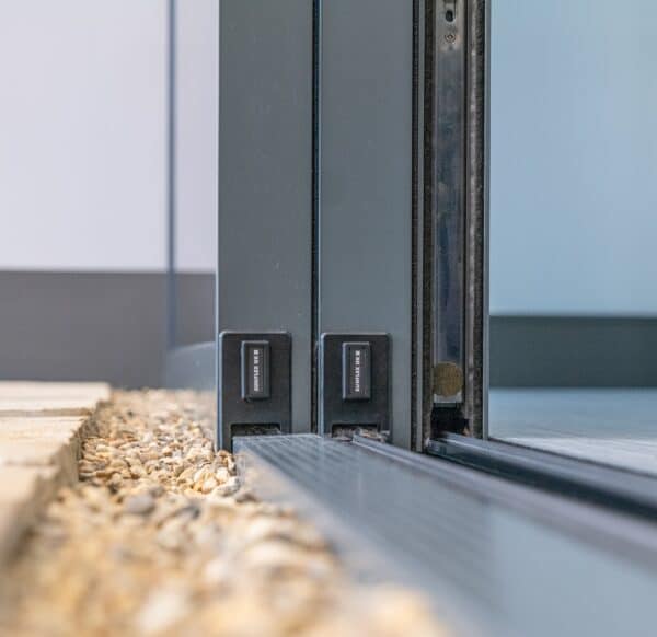 close up of sunflex sliding door flush track