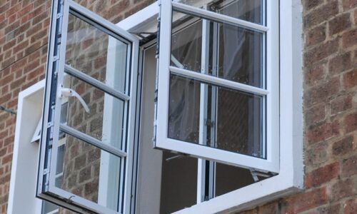 aluk residential systems showing white steel-look windows in flats