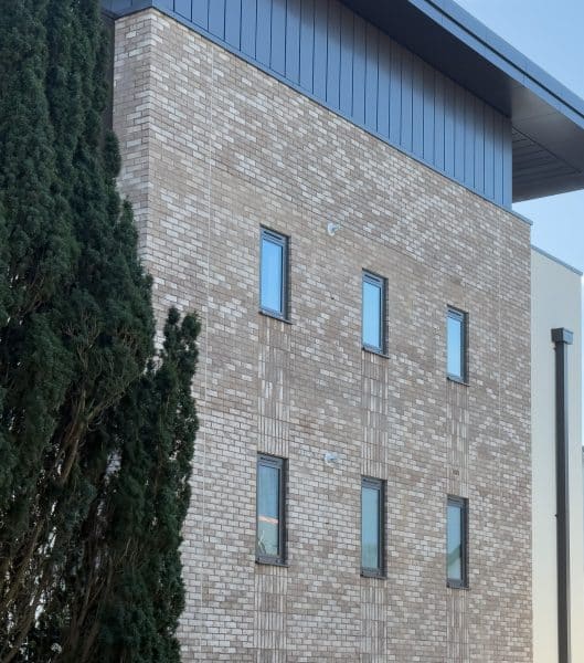 aluk windows in a contemporary apartment building