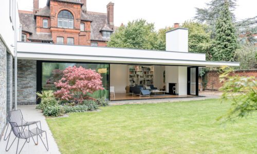 picture of a large house with bifolding or sliding doors