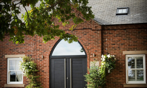 understanding front door cost: options and prices explained 2 outside view of endurance composite front door, double design with gothic head new front doors cost blog post