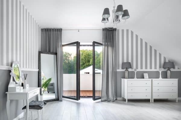 picture grey french doors in a contemporary decorated room opening in leading to balcony