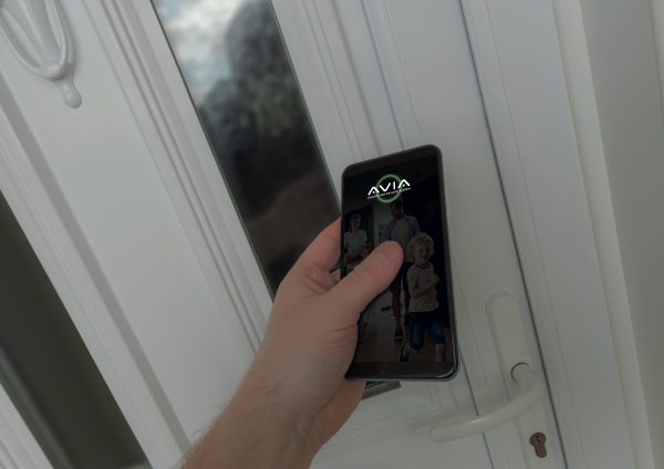 using a smartphone to open a smart door locks on a front door