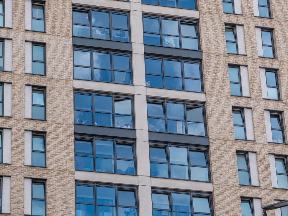 picture of high-rise apartments with tilt and turn windows showing both tilted and turned