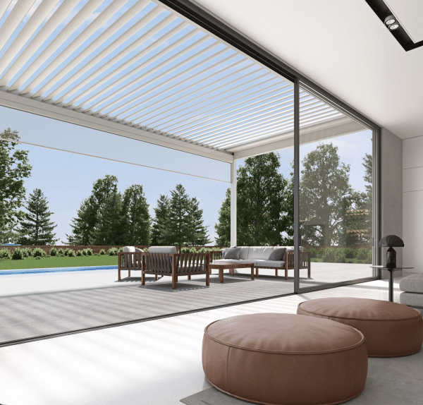 pergola with louvre roof leading to patio area and garden