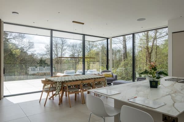luxview slide 54 open corner sliding doors in a contemporary kitchen