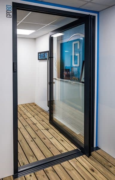 glideline gpd80 pivot door open in the glideline showroom