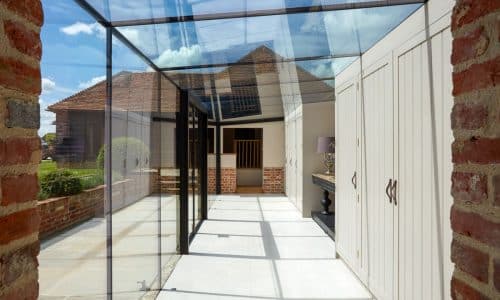 frameless glazed link with french doors and roof system