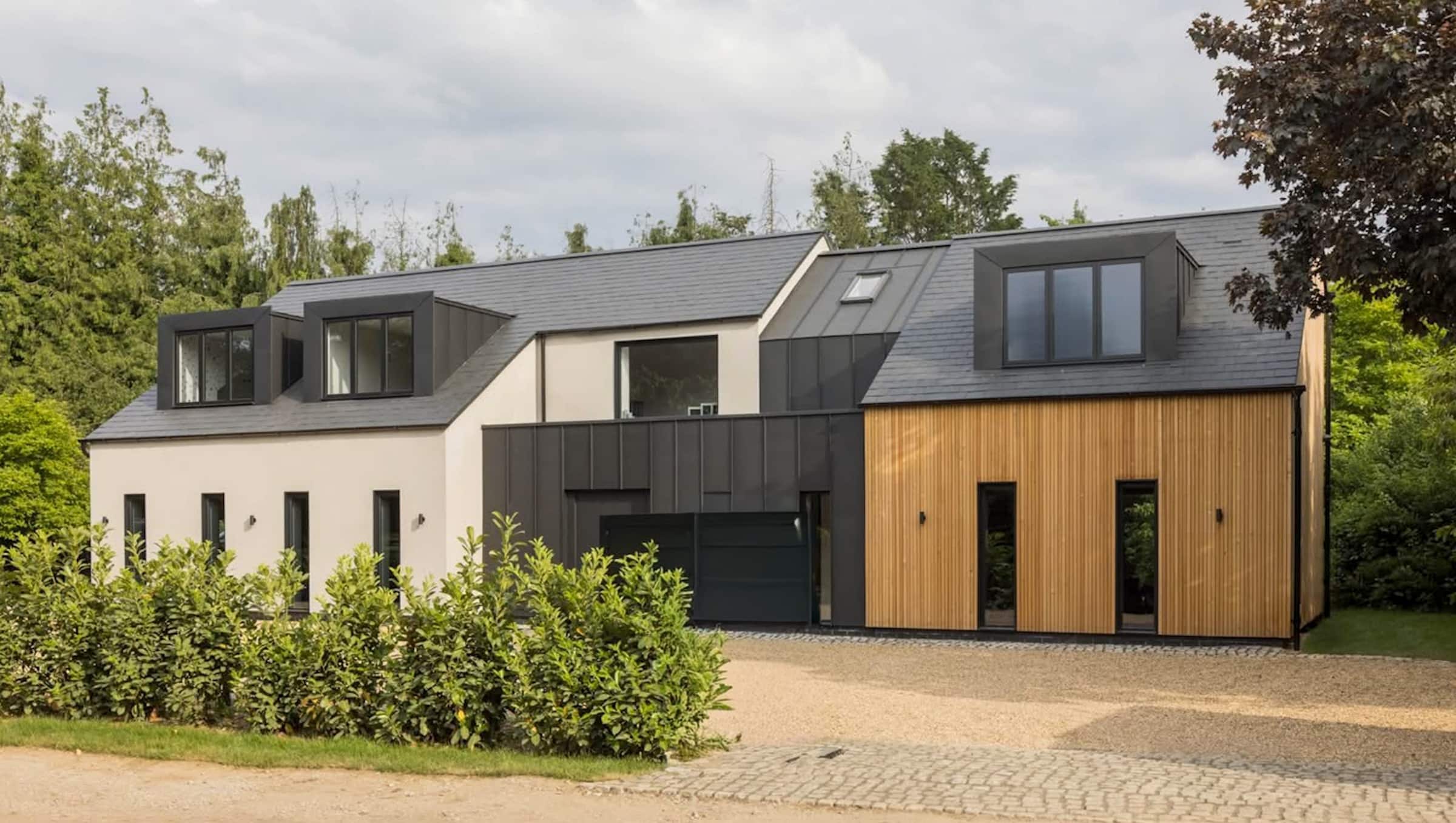 reynaers aluminium windows in a contemporary house with render and cedar cladding