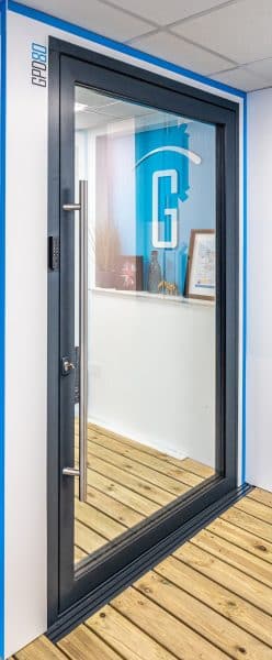 outside view of gpd80 pivot door showing smart lock keypad and pull handle