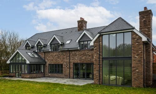 floor to ceiling windows 2 floor-to-ceiling windows using curtain walling to a mansion