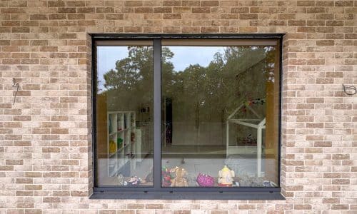 cortizo hidden sash tilt and turn window in new brickwork