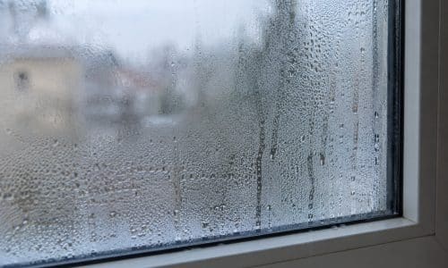 white aluminium window showing window condensation on the inside